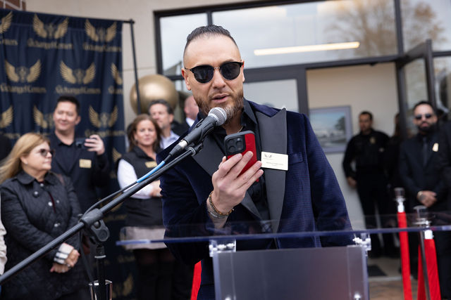 Mike Sorrentino speaking to guests at the grand opening